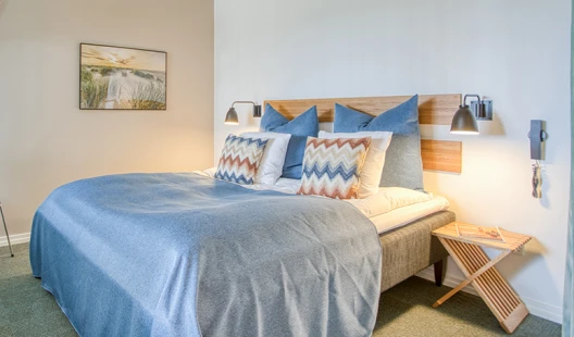 Sengeområde i juniorsuite